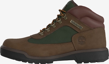 TIMBERLAND Boots med snörning i brun: framsida