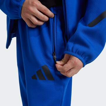 ADIDAS SPORTSWEAR Tapered Sports trousers in Blue