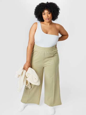 Public Desire Curve Loose fit Trousers in Green