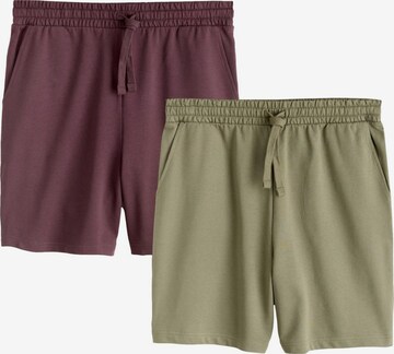 Pantaloni de la Next pe verde: față