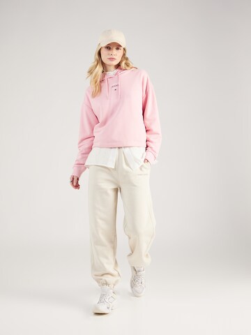 Tommy Jeans Sweatshirt 'ESSENTIAL' in Roze