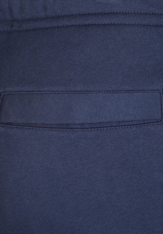 NIKE Tapered Sporthose 'Club19 CFD' in Blau