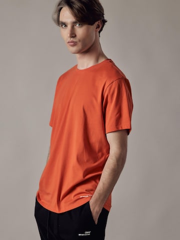 Maglietta 'Girocollo' di OWN Off With Nature in arancione