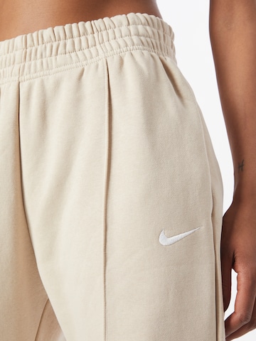 smėlio Nike Sportswear Laisvas Kelnės