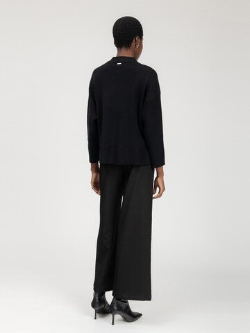 Influencer Pullover in Schwarz