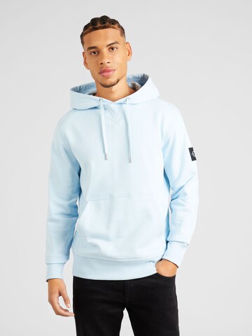 Sweat-shirt Calvin Klein Jeans en bleu : devant