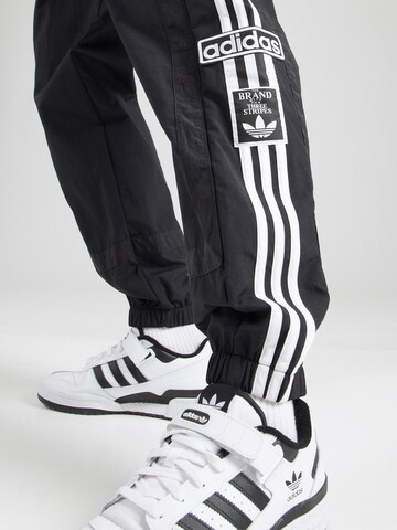 ADIDAS ORIGINALS - Tapered Pantalón 'ADIBREAK' en negro