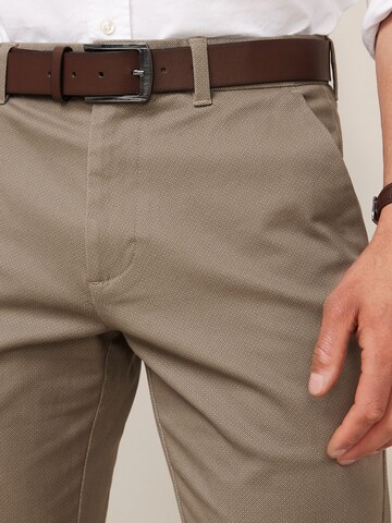 Slimfit Pantaloni chino di Next in beige