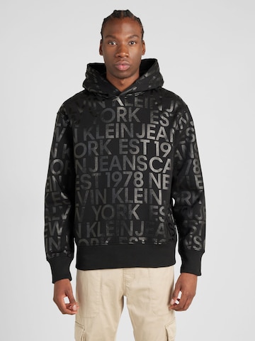 Sweat-shirt Calvin Klein Jeans en noir : devant