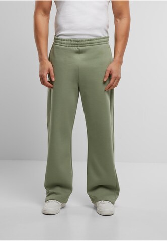 Karl Kani Loose fit Pants in Green: front