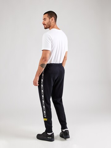Nike Sportswear Tapered Broek in Zwart