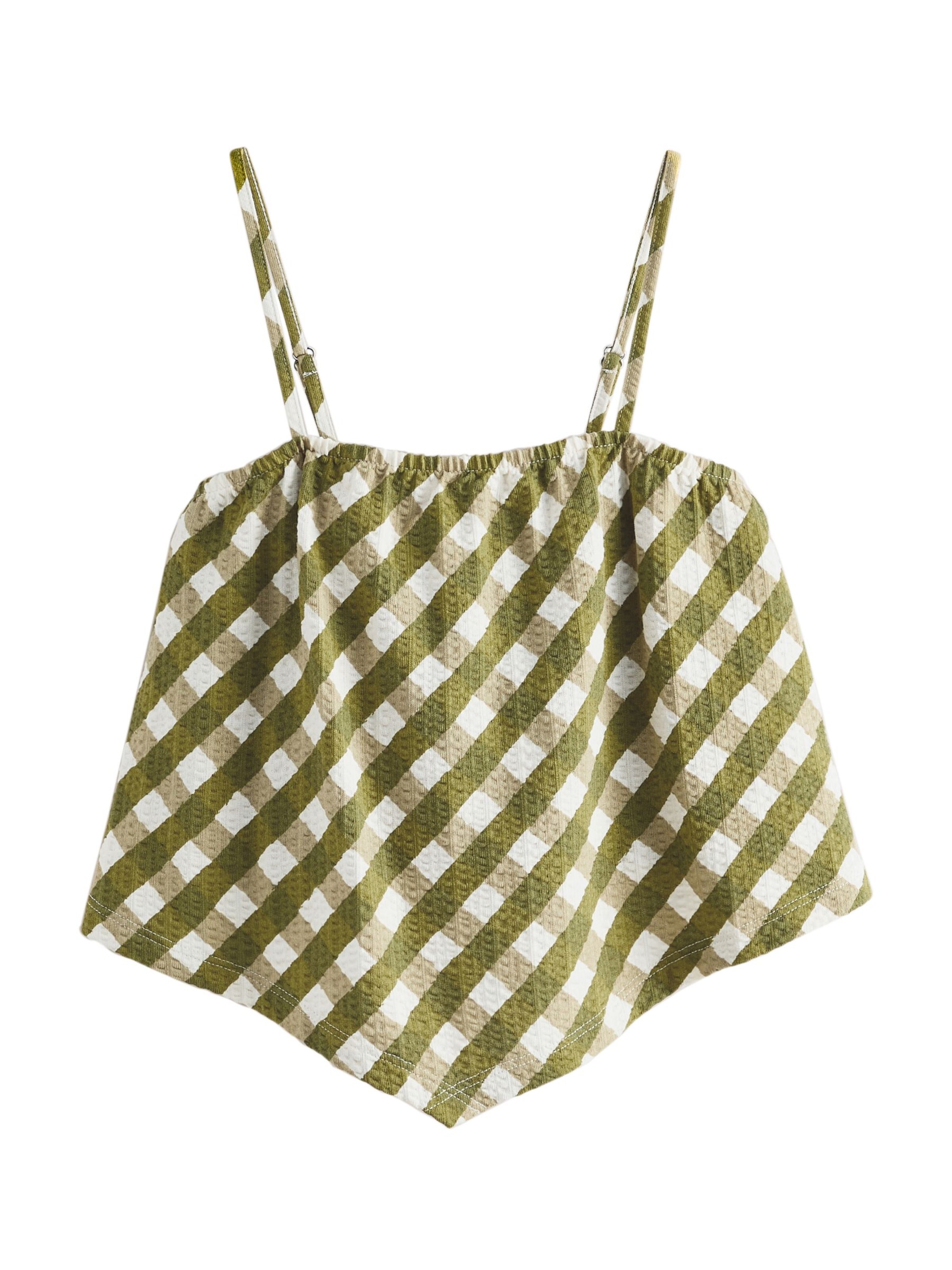 Top di Next in verde: frontale