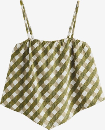 Top di Next in verde: frontale