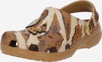 Chaussures ouvertes 'Jurassic World' Crocs en beige : devant