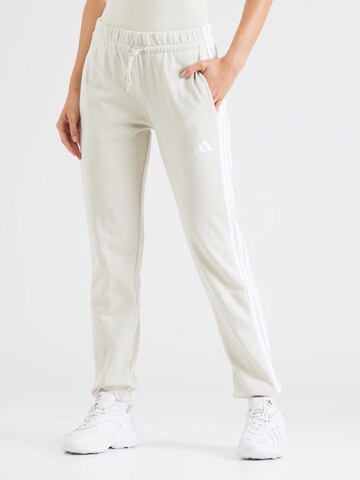 ADIDAS SPORTSWEAR Конический (Tapered) Спортивные штаны 'Essentials' в Бежевый: спереди