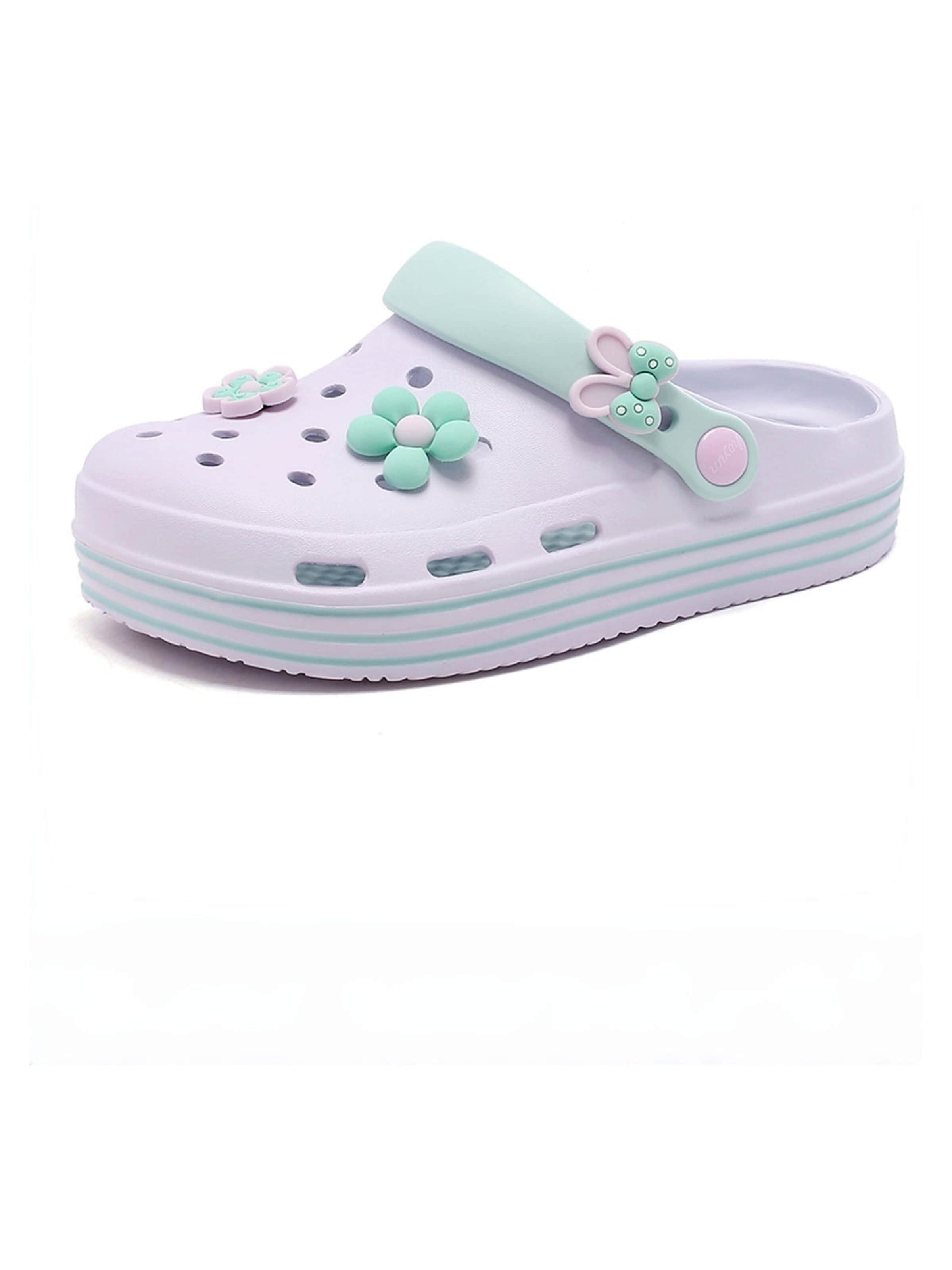 HUSKSWARE Clogs in Purple: front