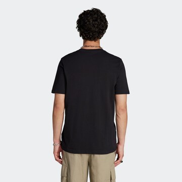 ADIDAS ORIGINALS Shirt 'Graphics Camo Tongue Label' in Schwarz