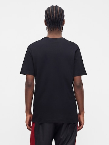 Nike Sportswear - Camisa em preto