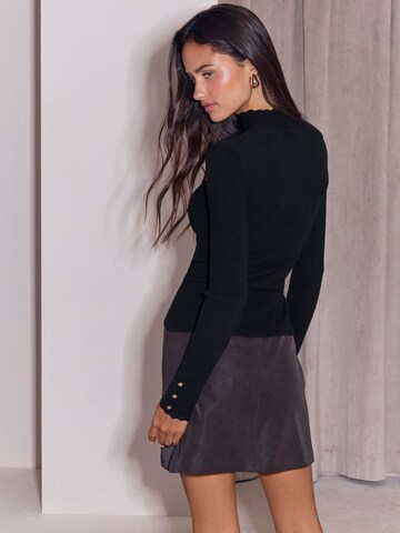 juoda Lipsy Megztinis