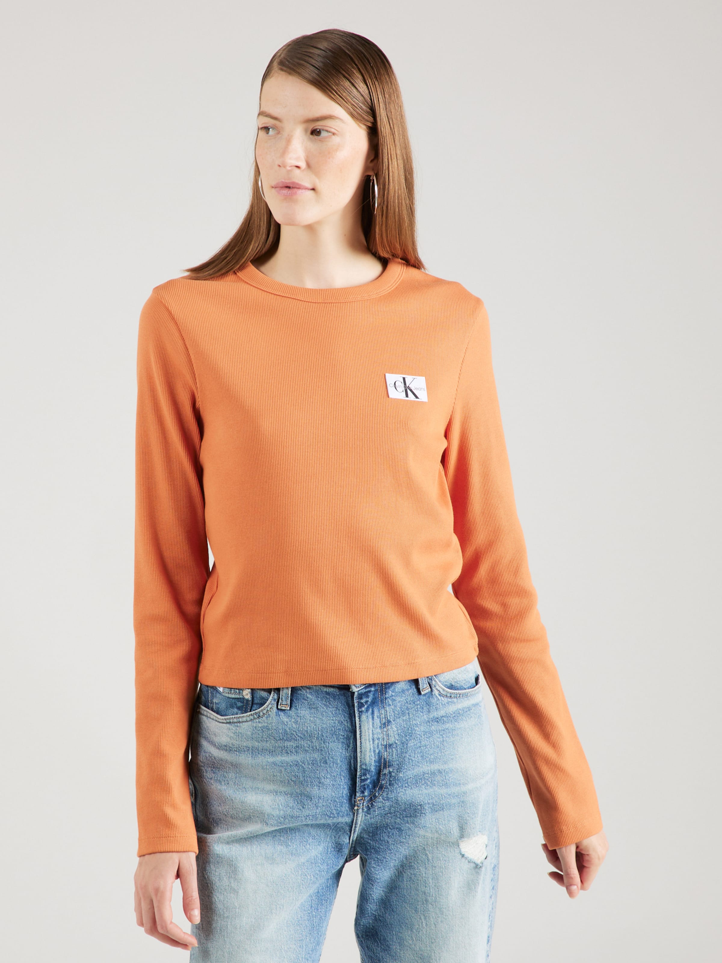 Orange calvin best sale klein shirt