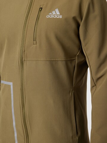 ADIDAS SPORTSWEAR Sportjacke 'Own The Run' in Grün