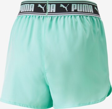 Regular Pantaloni sport de la PUMA pe verde