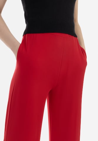 faina - Loosefit Pantalón en rojo