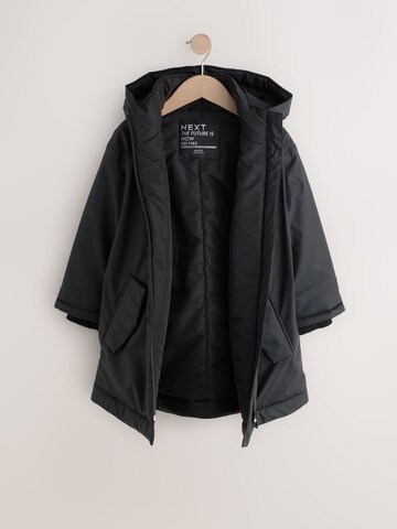 Next Mantel in Schwarz