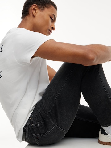 Coupe slim Jean 'Ryan' Tommy Jeans en noir