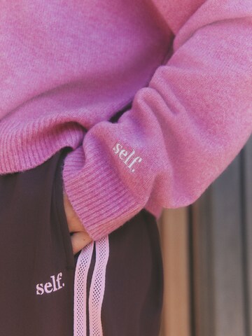 Pull-over self. en rose