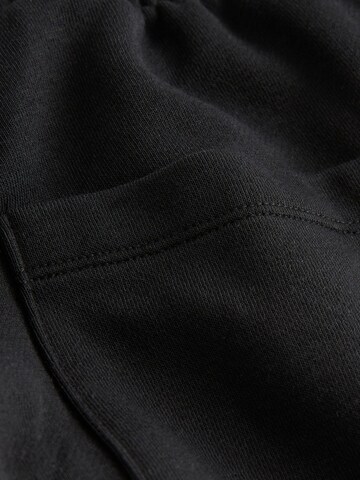Next - Tapered Pantalón en negro