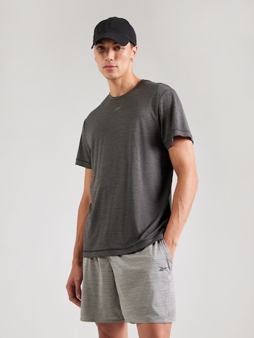 Reebok Performance shirt 'TRAIN' in Black: front