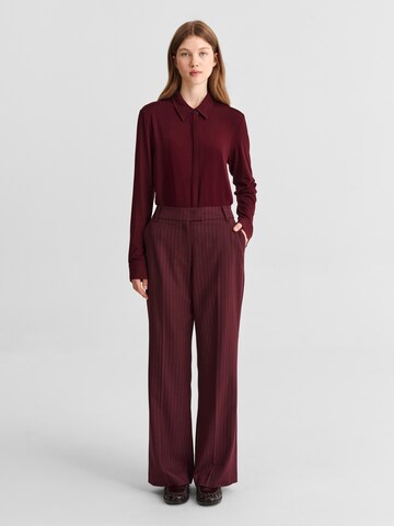 regular Pantaloni con piega frontale 'Zariana 1' di TATUUM in rosso