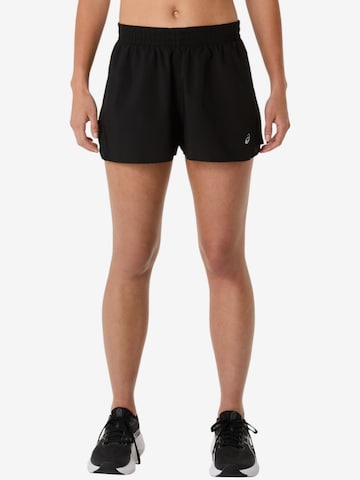 Regular Pantalon de sport ASICS en noir : devant