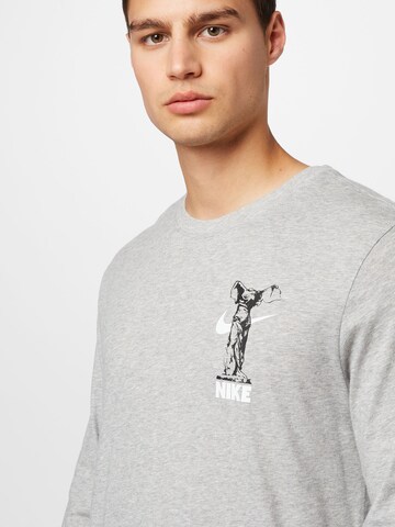 T-Shirt fonctionnel NIKE en gris