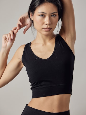 Top di OWN Off With Nature in nero