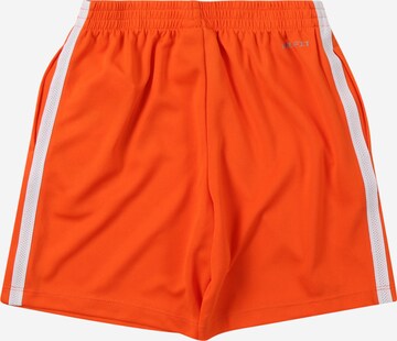 Nike Sportswear Štandardný strih Nohavice - oranžová