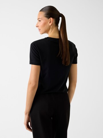 GUESS T-Shirt in Schwarz