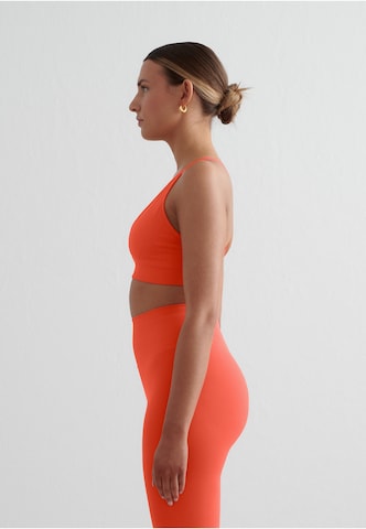 Bustino Reggiseno sportivo di Aim'n in arancione