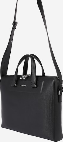 Calvin KleinAktovka torba - crna boja: prednji dio