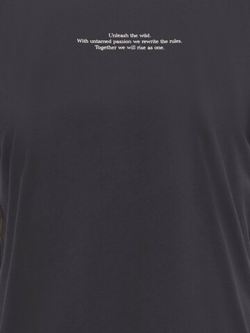 ONLY Carmakoma T-shirt 'CARROXY' i svart