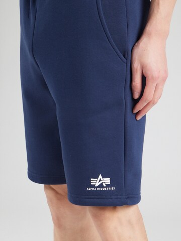 regular Pantaloni di ALPHA INDUSTRIES in blu