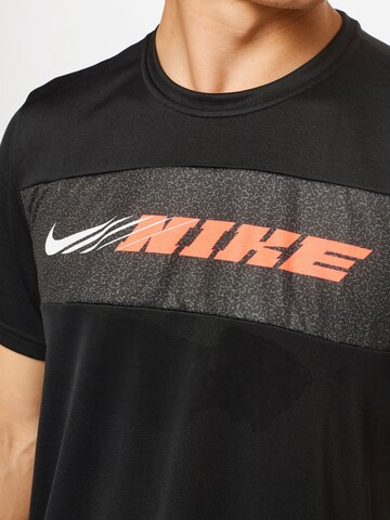 NIKE Performance Shirt 'Superset Energy' in Black