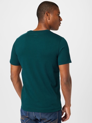 LEVI'S ® Póló 'Original Housemark Tee' - zöld