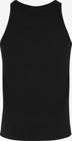 Karl Kani Koszulka 'Essential' w kolorze czarny