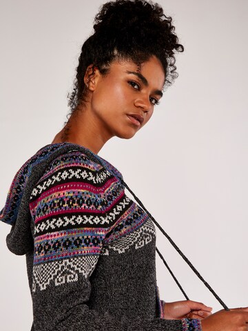 Pull-over 'Fairisle' Apricot en gris
