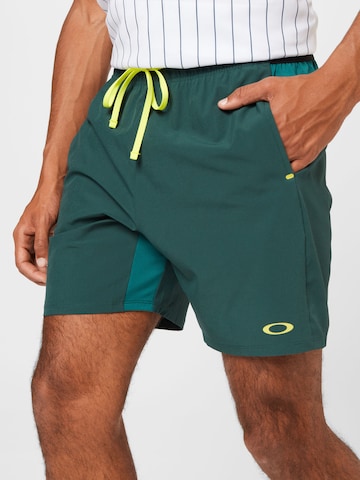 OAKLEY Regular Workout Pants in Green