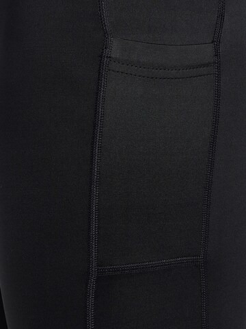 Skinny Pantaloni sport de la Hummel pe negru