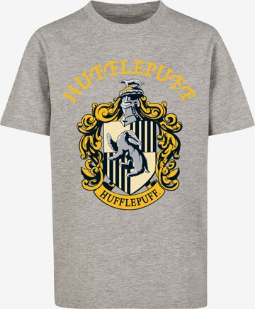 Maglietta 'Harry Potter Hufflepuff Crest' di F4NT4STIC in grigio: frontale