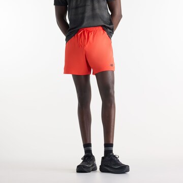 Pantaloni sportivi 'RC Essential Short 5"' di new balance in arancione: frontale